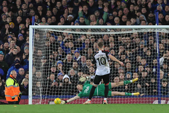 Fulham's Tom Cairney pictured narrowly beating Everton goalkeeper Jordan Pickford during a penalty shootout in the quarter-finals of the EFL Cup in December 2023